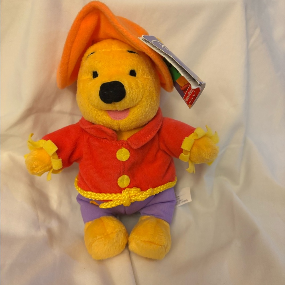 Vintage Disney Winnie the Pooh as scarecrow plush for Halloween